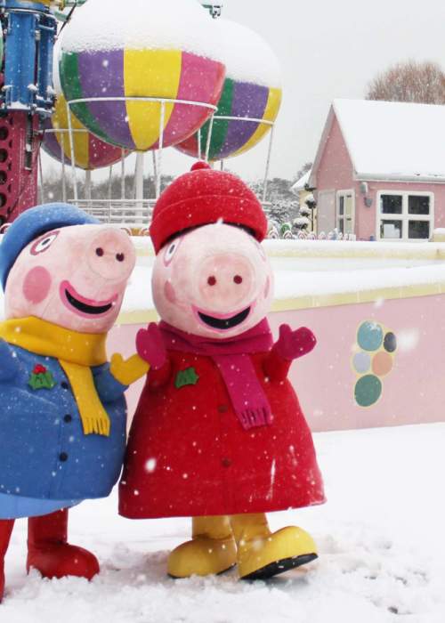 Peppa and George in the snow at Peppa Pig World at Paultons Park in the New Forest