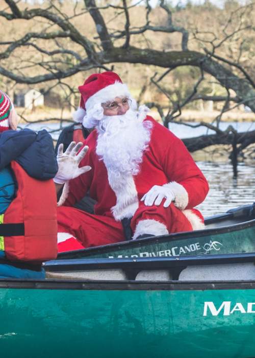 Santa on canoe with New Forest Activities in the New Forest