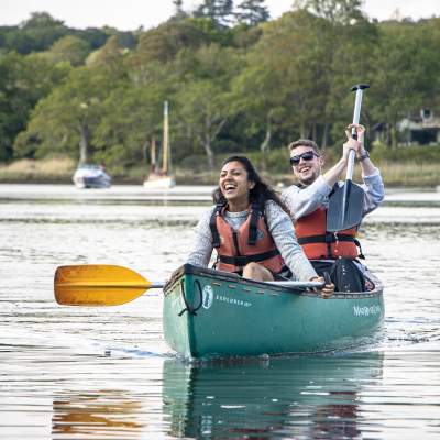 Two people canoeing on Beaulieu River with New Forest Activities - Things to Do Feature